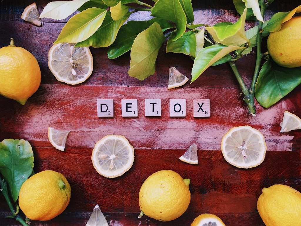 A picture of limes and lemons and scrabble tiles that spell out [Vicodin] detox.